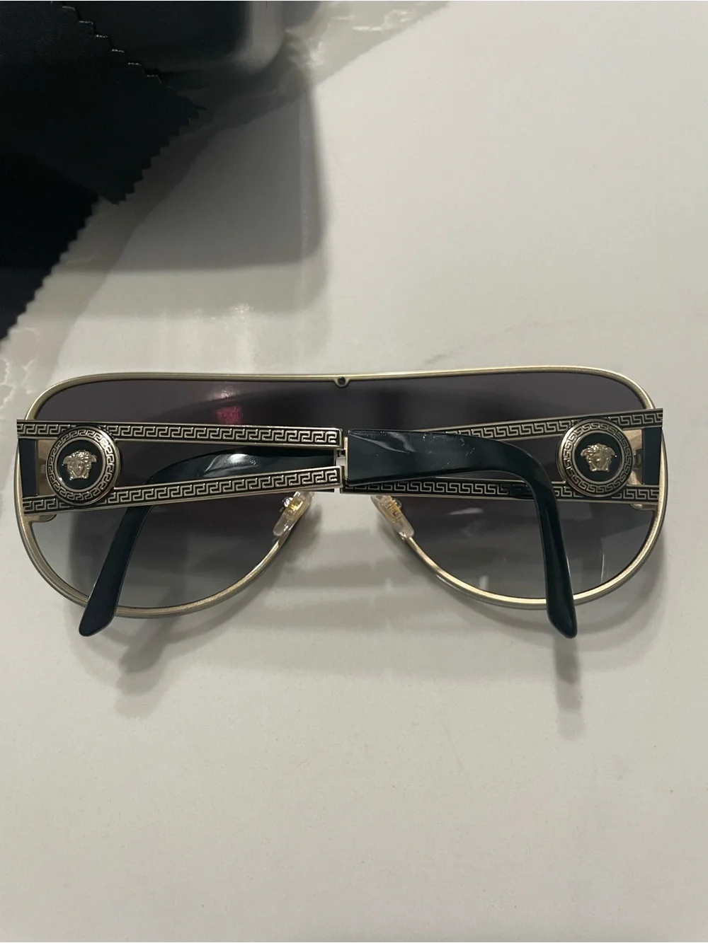 Gucci bold shield
